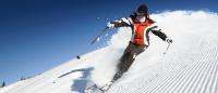 Woman downhill skiing